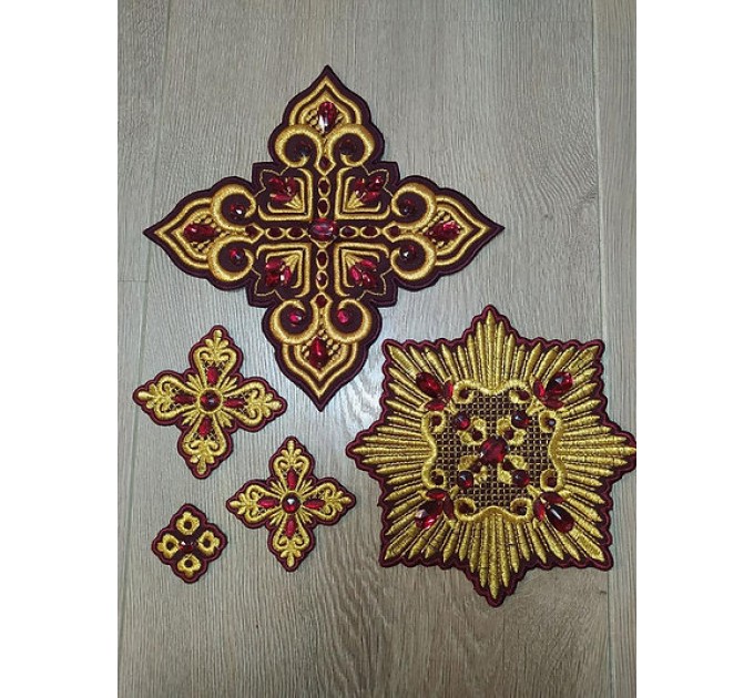 Set of 14 embroidered crosses with decorative stones