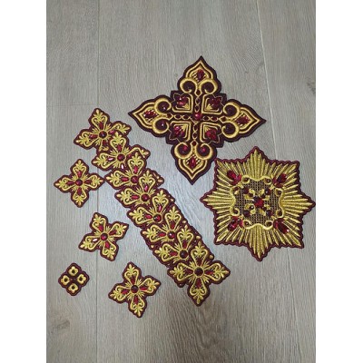 Set of 14 embroidered crosses with decorative stones