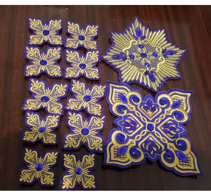 Set of 14 embroidered crosses with decorative stones