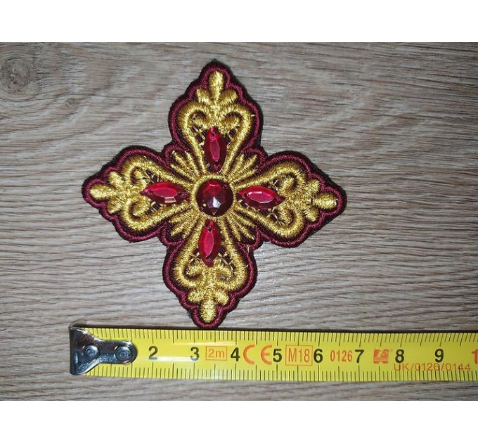 Set of 14 embroidered crosses with decorative stones