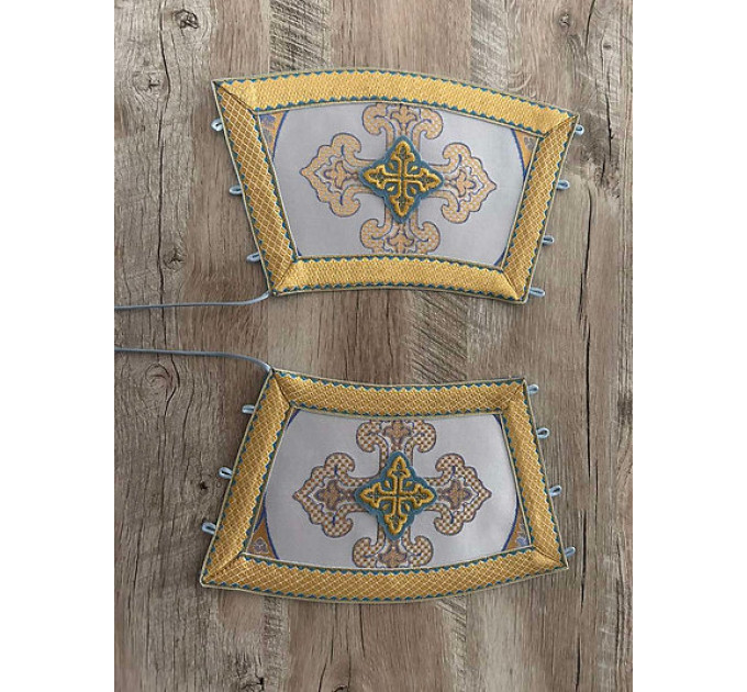 Pair of cuffs to match the vestment